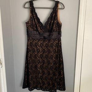 Short, lace, sleeveless, a-line, little black dress in size 16 by S.L. Fashion